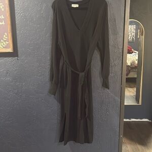 Beautiful black sweater dress with tie around waist.